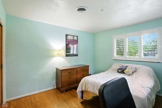 4340 Ashbourne Ln, Indianapolis, IN 46226 - bedroom with wood-type flooring and baseboards