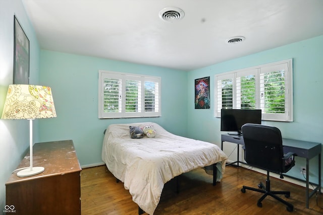 4340 Ashbourne Ln, Indianapolis, IN 46226 - bedroom featuring wood finished floors and a desk