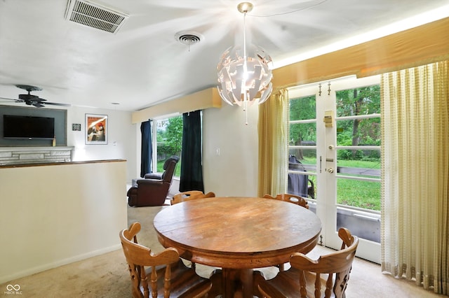 4340 Ashbourne Ln, Indianapolis, IN 46226 - dining area featuring carpet floors, a chandelier, and ceiling fan