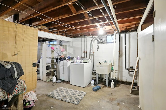 4340 Ashbourne Ln, Indianapolis, IN 46226 - unfinished basement featuring washer and dryer and a sink