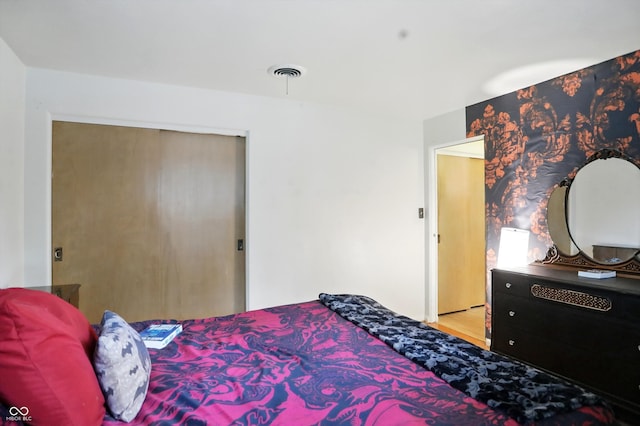4340 Ashbourne Ln, Indianapolis, IN 46226 - bedroom featuring a closet and wood finished floors