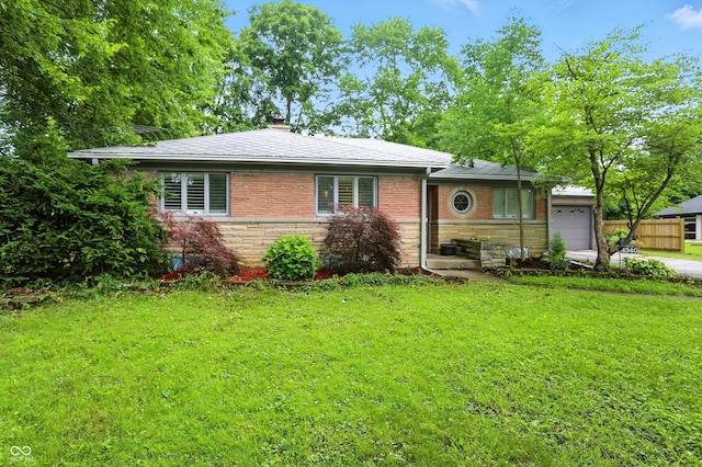 4340 Ashbourne Ln, Indianapolis, IN 46226 - view of front of house with an attached garage, stone siding, a chimney, and concrete driveway