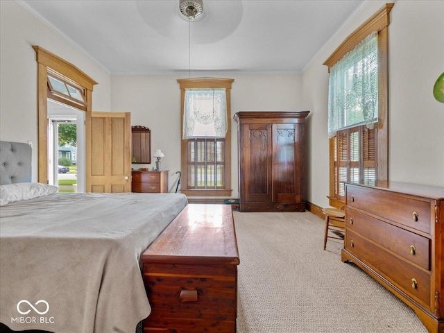 228 W Washington St, Shelbyville, IN 46176 - carpeted bedroom featuring ornamental molding and a ceiling fan