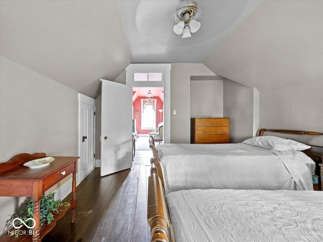228 W Washington St, Shelbyville, IN 46176 - bedroom featuring dark wood-type flooring and lofted ceiling