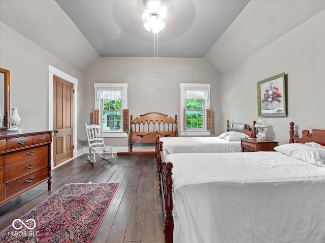228 W Washington St, Shelbyville, IN 46176 - bedroom featuring vaulted ceiling, dark wood-style floors, and a ceiling fan