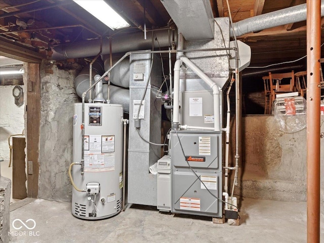 228 W Washington St, Shelbyville, IN 46176 - utility room featuring gas water heater and heating unit