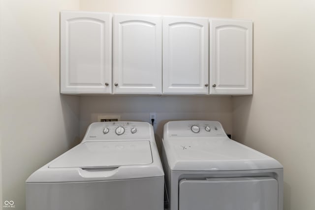 564 Parkhurst Ct, Greenwood, IN 46142 - laundry room featuring independent washer and dryer and cabinet space