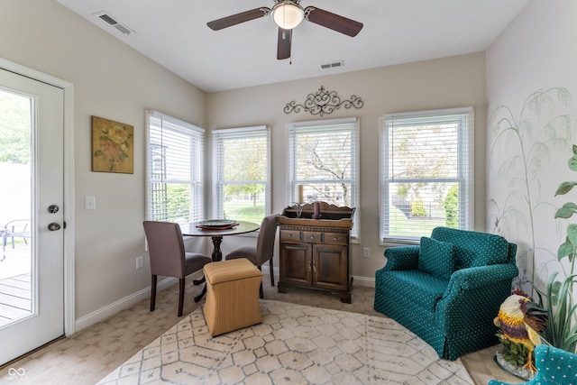 564 Parkhurst Ct, Greenwood, IN 46142 - dining space featuring ceiling fan and light carpet