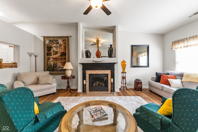 564 Parkhurst Ct, Greenwood, IN 46142 - living room with a ceiling fan, wood finished floors, and a tiled fireplace