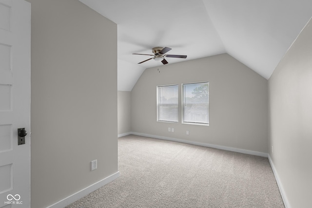 1310 California St, Columbus, IN 47201 - additional living space featuring carpet floors, lofted ceiling, and ceiling fan