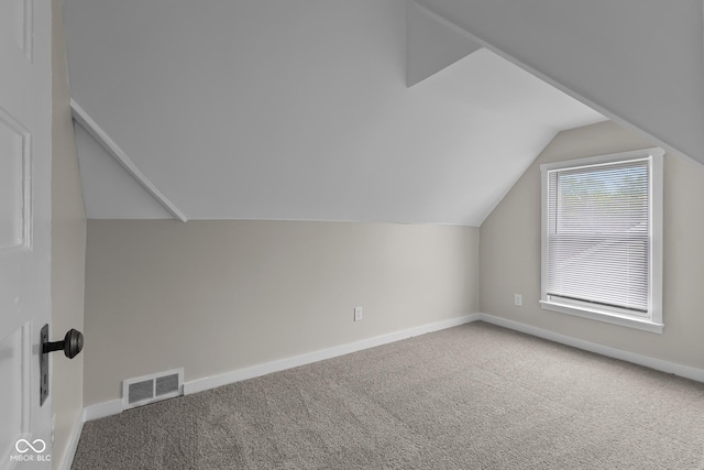 1310 California St, Columbus, IN 47201 - bonus room featuring carpet floors and lofted ceiling