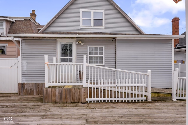 1310 California St, Columbus, IN 47201 - rear view of property featuring a wooden deck and a shingled roof
