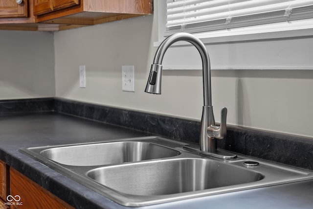 1310 California St, Columbus, IN 47201 - kitchen view of brown cabinetry and dark countertops