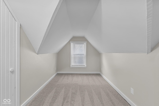 1310 California St, Columbus, IN 47201 - additional living space featuring carpet floors and lofted ceiling