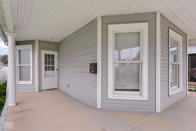 1310 California St, Columbus, IN 47201 - doorway to property featuring a patio area