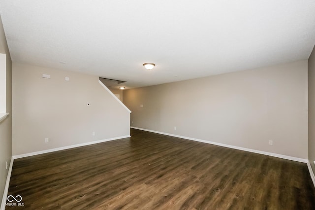 8310 Becks Mill Ln, Indianapolis, IN 46113 - unfurnished living room featuring dark wood finished floors and stairway