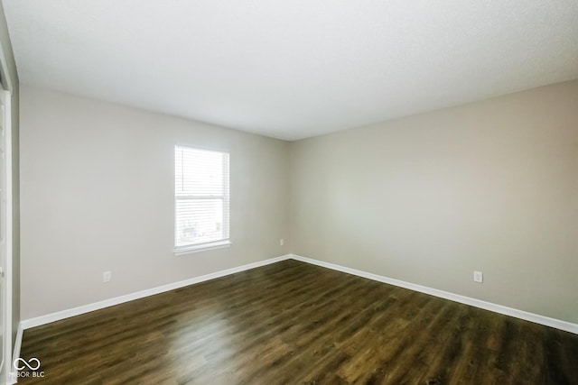 8310 Becks Mill Ln, Indianapolis, IN 46113 - unfurnished room with dark wood finished floors