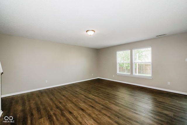 8310 Becks Mill Ln, Indianapolis, IN 46113 - unfurnished room with dark wood finished floors and baseboards