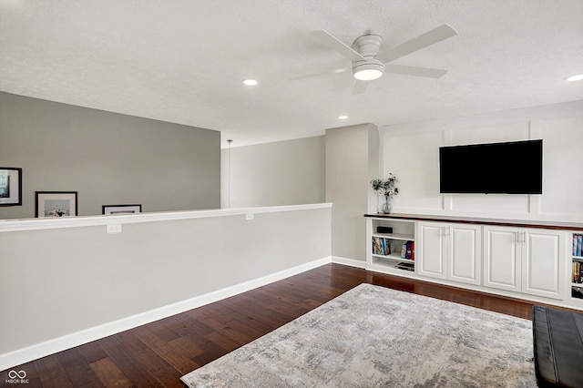 9653 Cypress Way, Carmel, IN 46032 - sitting room with ceiling fan, wood finished floors, recessed lighting, and a textured ceiling