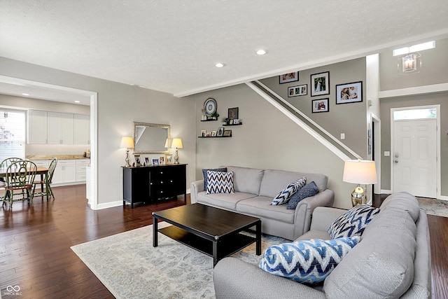 9653 Cypress Way, Carmel, IN 46032 - living area with a textured ceiling, dark wood-style flooring, and recessed lighting