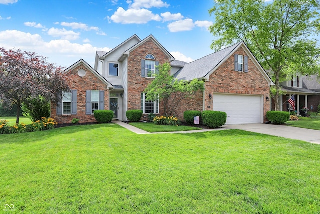 9653 Cypress Way, Carmel, IN 46032 - traditional home with brick siding, concrete driveway, an attached garage, and a front lawn