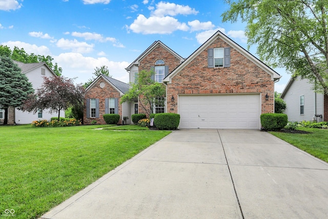 9653 Cypress Way, Carmel, IN 46032 - traditional home featuring a garage, brick siding, concrete driveway, and a front yard