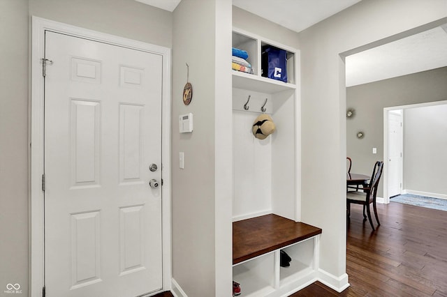 9653 Cypress Way, Carmel, IN 46032 - mudroom featuring dark wood-style flooring and baseboards