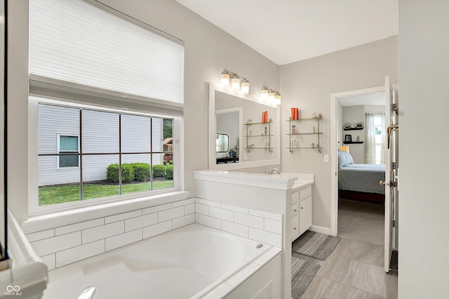 9653 Cypress Way, Carmel, IN 46032 - ensuite bathroom with a garden tub and vanity
