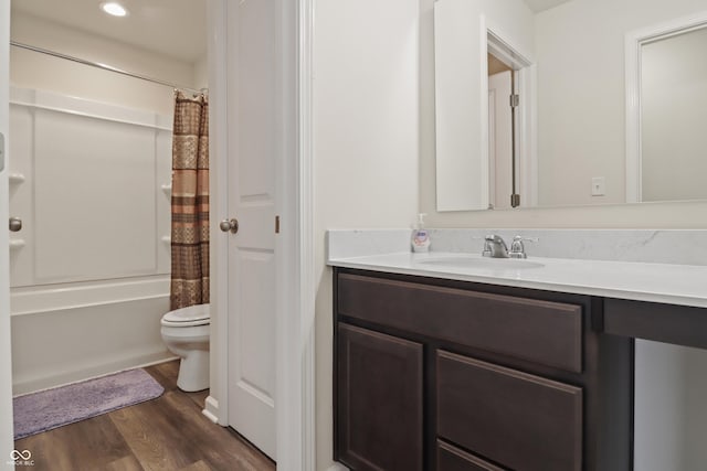10811 Wild Orchard Ln, Indianapolis, IN 46239 - full bathroom featuring vanity, wood finished floors, and shower / bathtub combination with curtain