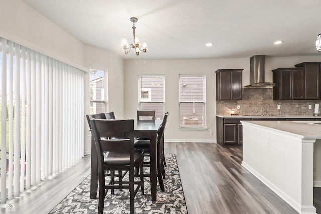10811 Wild Orchard Ln, Indianapolis, IN 46239 - dining space featuring dark wood-style floors, a chandelier, and recessed lighting