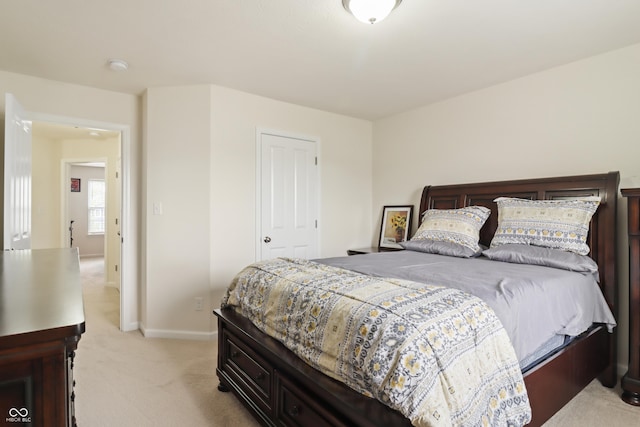10811 Wild Orchard Ln, Indianapolis, IN 46239 - bedroom featuring light colored carpet and baseboards