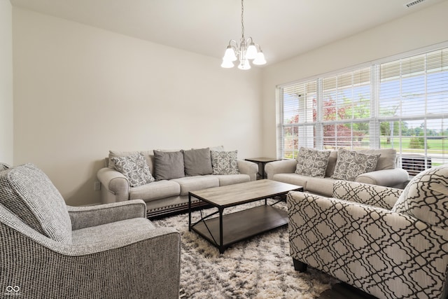 10811 Wild Orchard Ln, Indianapolis, IN 46239 - living area featuring a chandelier and healthy amount of natural light