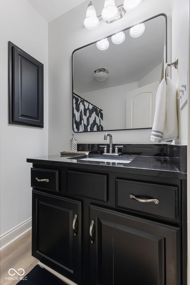 4396 W Eagle Trce, New Palestine, IN 46163 - bathroom featuring vanity and wood finished floors