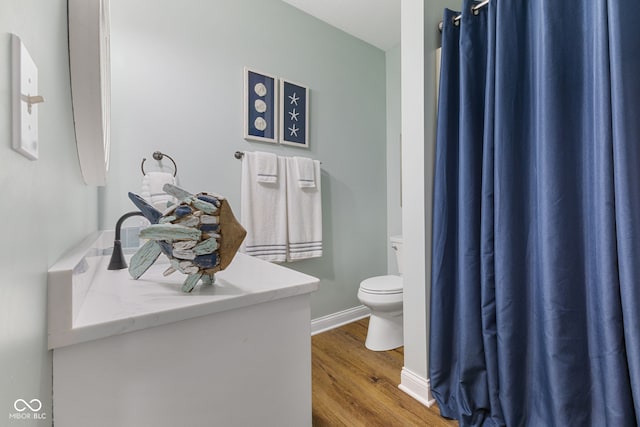 4396 W Eagle Trce, New Palestine, IN 46163 - bathroom with wood finished floors, vanity, and curtained shower