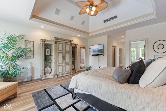 4396 W Eagle Trce, New Palestine, IN 46163 - bedroom with a raised ceiling, light wood-style floors, and recessed lighting