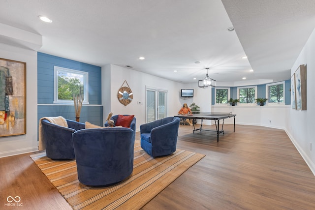 4396 W Eagle Trce, New Palestine, IN 46163 - living room with recessed lighting, wood finished floors, and a chandelier