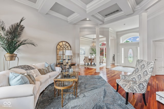 4396 W Eagle Trce, New Palestine, IN 46163 - living room with ornate columns, coffered ceiling, ornamental molding, a chandelier, and beam ceiling