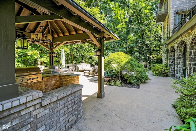11557 Willow Springs Dr, Zionsville, IN 46077 - view of patio / terrace with exterior kitchen and a gazebo