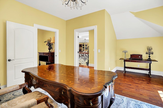 11557 Willow Springs Dr, Zionsville, IN 46077 - dining area with a chandelier and dark wood finished floors