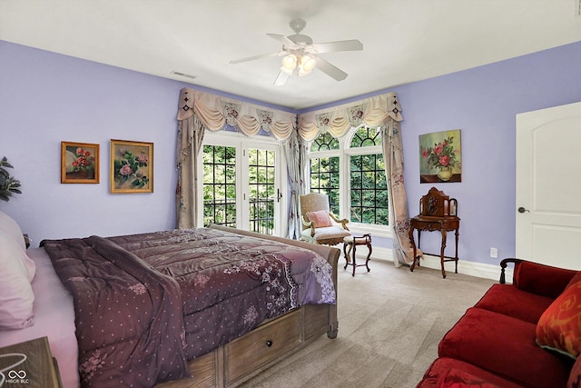 11557 Willow Springs Dr, Zionsville, IN 46077 - bedroom with carpet, access to outside, and a ceiling fan