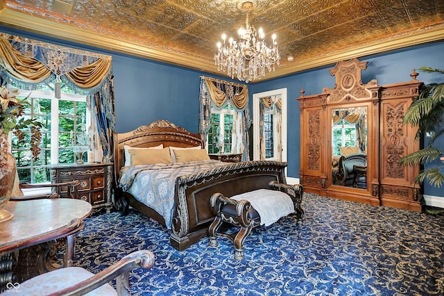 11557 Willow Springs Dr, Zionsville, IN 46077 - carpeted bedroom featuring crown molding, a chandelier, and an ornate ceiling