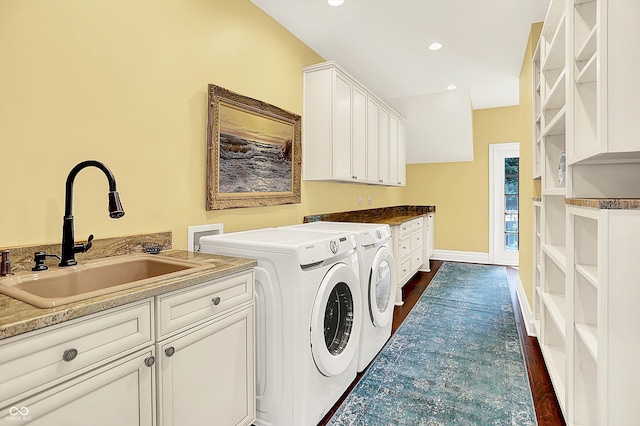 11557 Willow Springs Dr, Zionsville, IN 46077 - laundry area with cabinet space, separate washer and dryer, recessed lighting, and dark wood-style floors