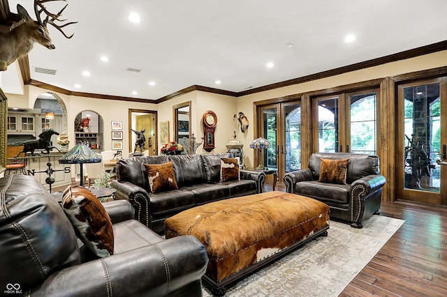 11557 Willow Springs Dr, Zionsville, IN 46077 - living area with dark wood finished floors, recessed lighting, crown molding, and french doors