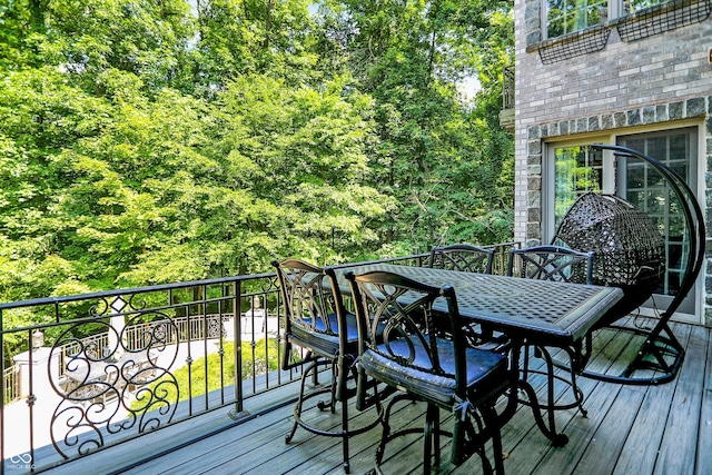 11557 Willow Springs Dr, Zionsville, IN 46077 - deck with outdoor dining area and a forest view