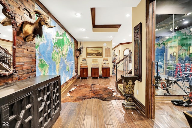 11557 Willow Springs Dr, Zionsville, IN 46077 - hall featuring stairs, hardwood / wood-style flooring, and crown molding