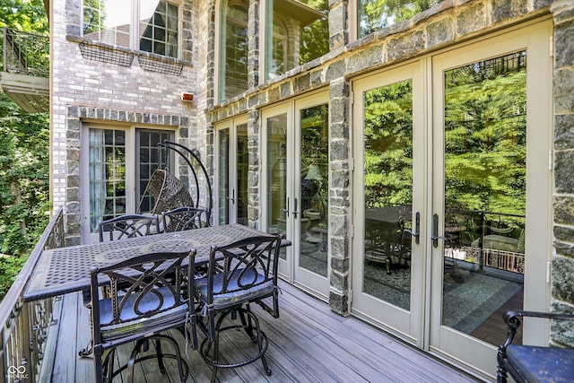 11557 Willow Springs Dr, Zionsville, IN 46077 - sunroom / solarium with french doors and outdoor dining space