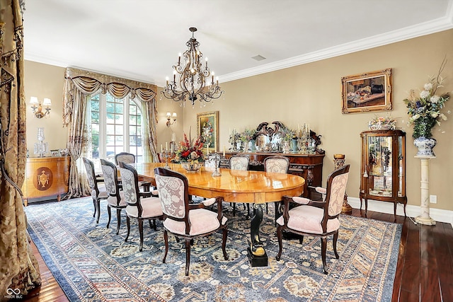 11557 Willow Springs Dr, Zionsville, IN 46077 - dining room with a chandelier, wood-type flooring, and ornamental molding
