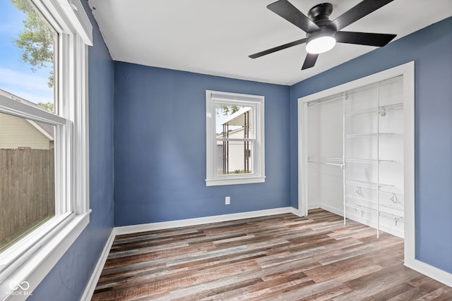 1739 Caldwell Pl, Columbus, IN 47201 - unfurnished bedroom featuring wood finished floors, a closet, and ceiling fan