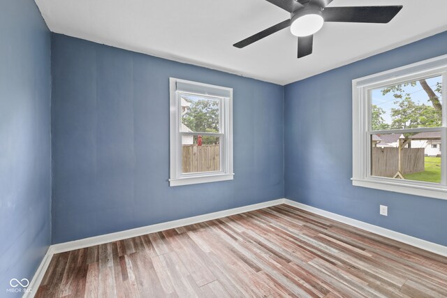 1739 Caldwell Pl, Columbus, IN 47201 - empty room with wood finished floors and ceiling fan