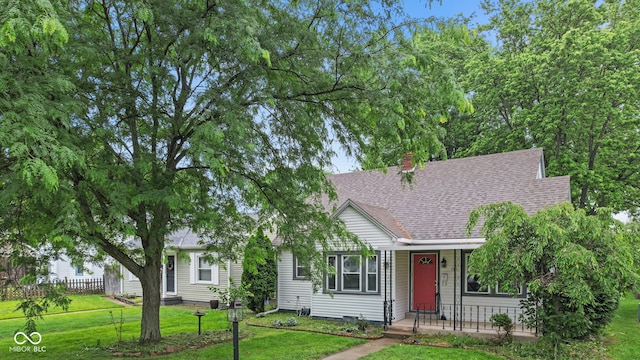 1739 Caldwell Pl, Columbus, IN 47201 - view of front facade with roof with shingles and a chimney